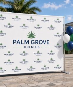 Step and repeat backdrop at a model home grand opening