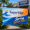 Custom vinyl banner on a fence